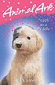 PUPPY IN A PUDDLE